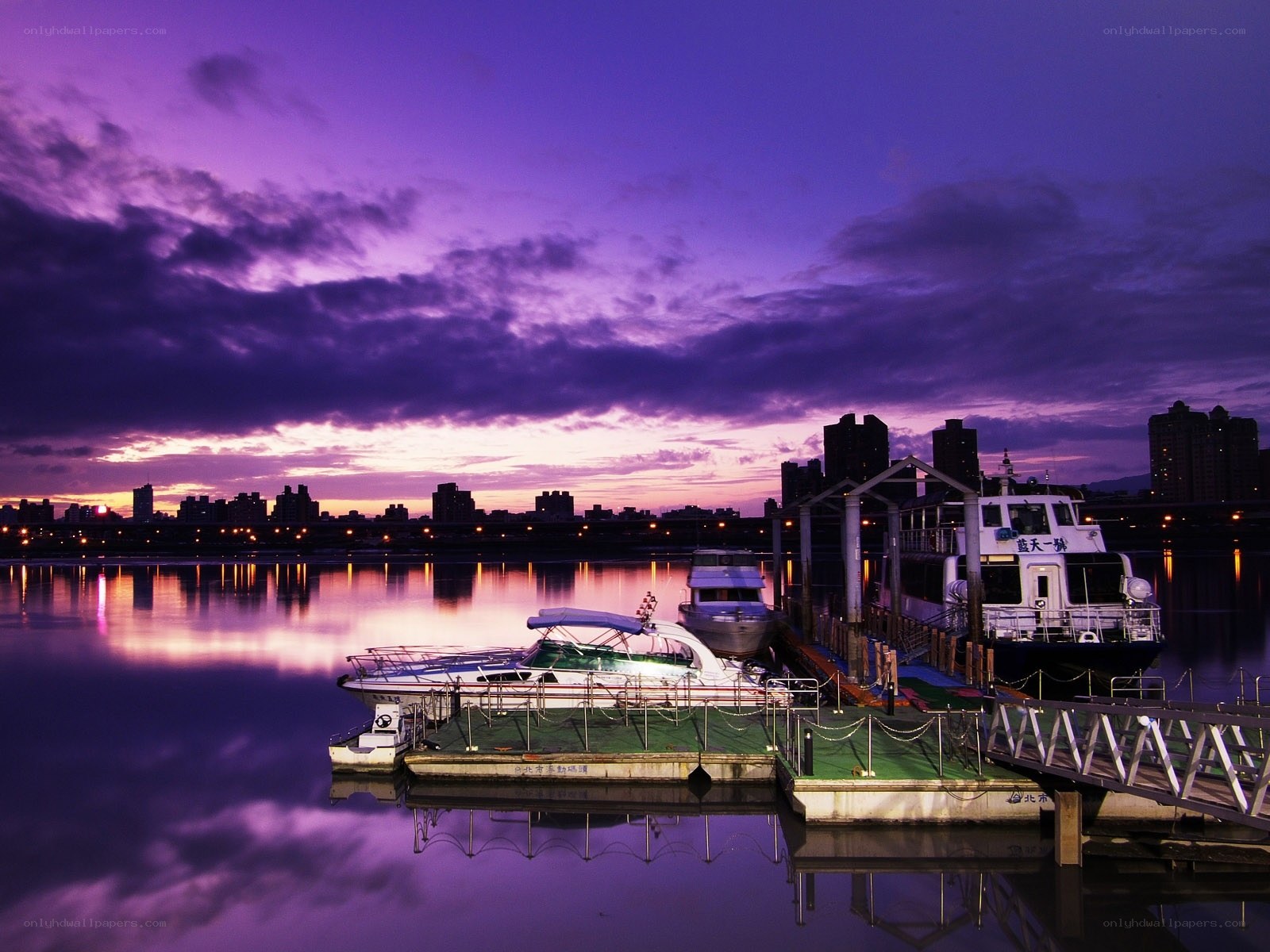 Purple sunset over a harbor