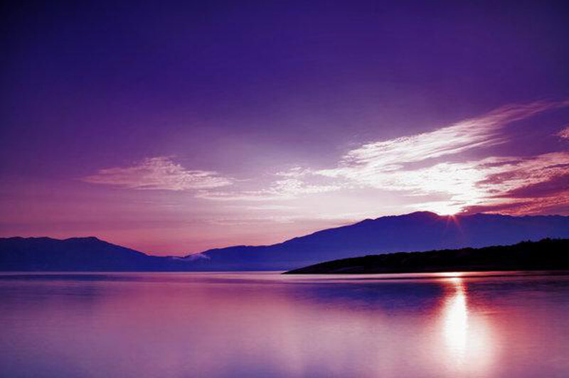 Purple sunset over a lake