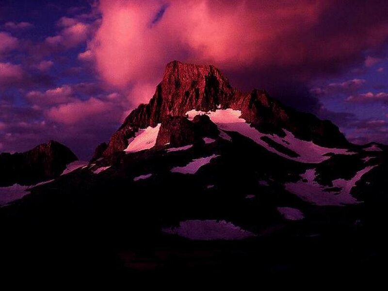 Purple sunset over a mountain peak