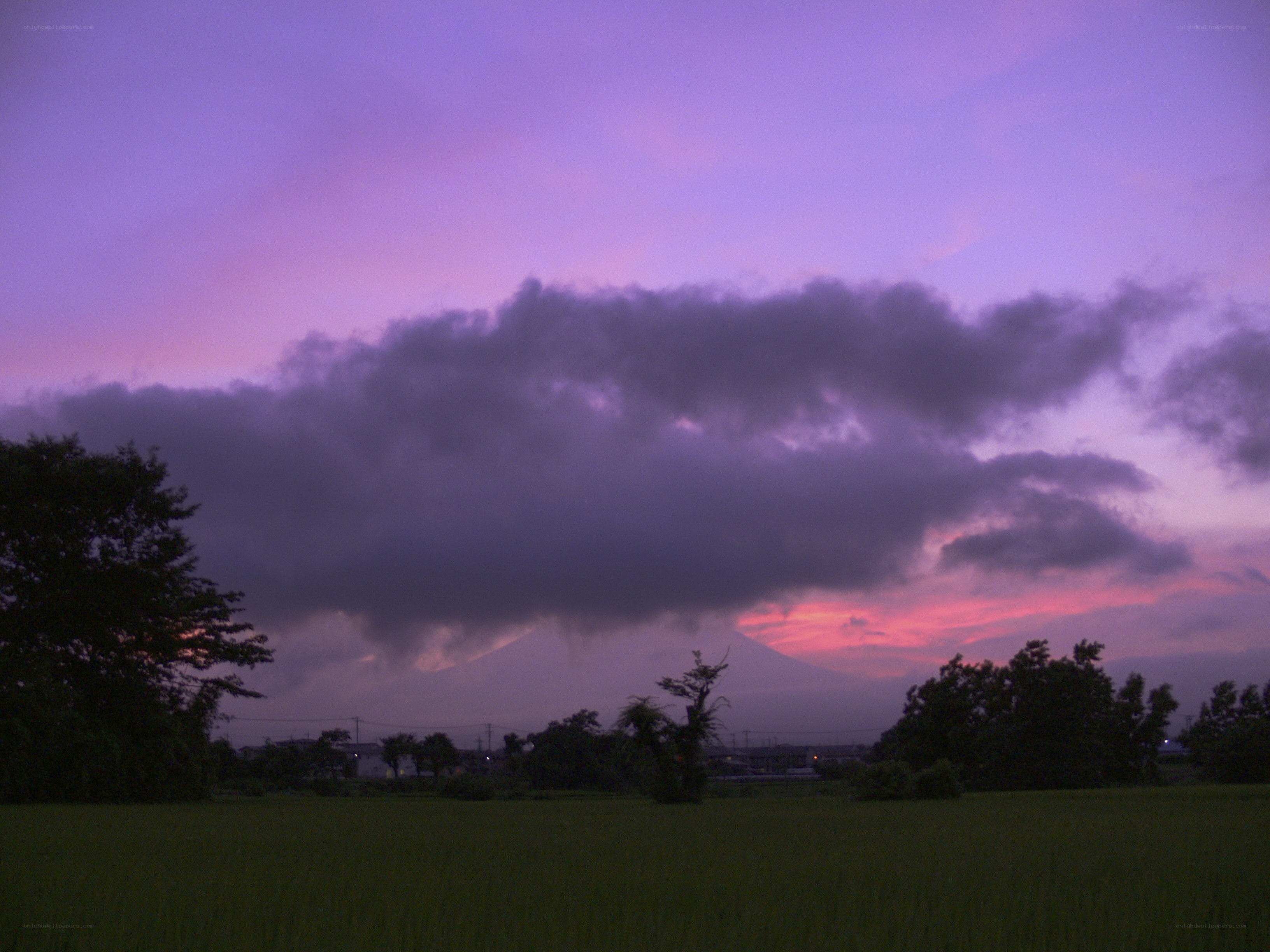 Purple sunset over a mountain