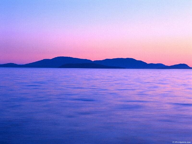 Purple sunset over calm sea