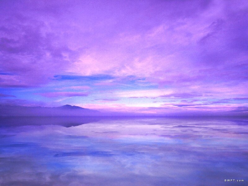 Purple sunset over calm water