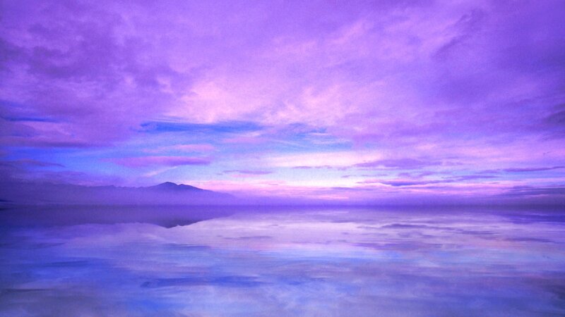 Purple sunset over calm water