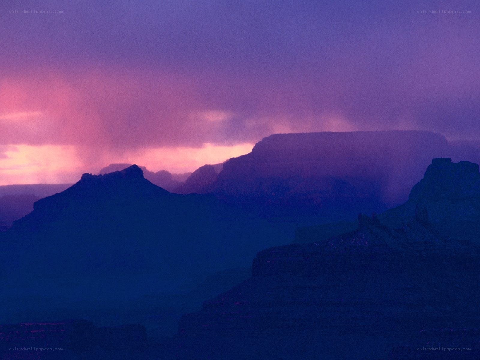 Purple sunset over canyon