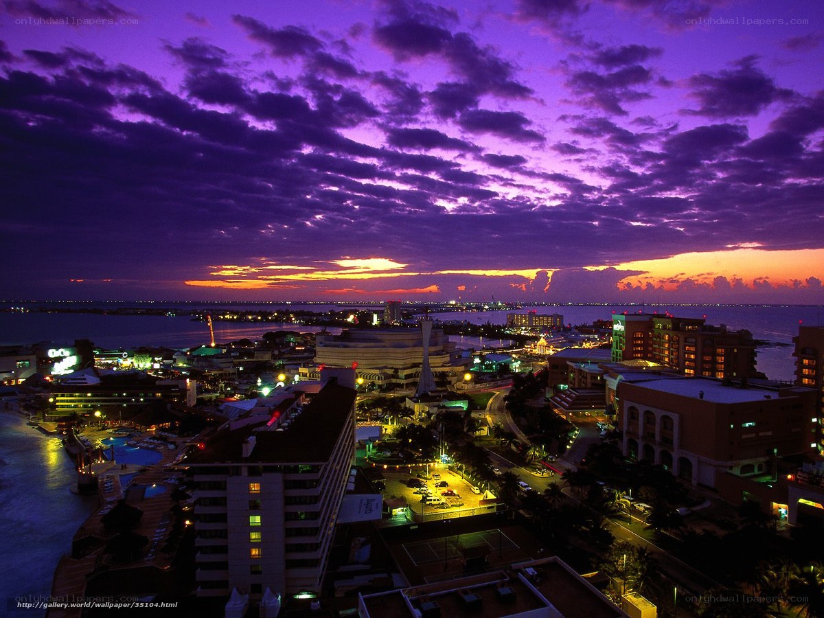 Purple sunset over coastal city