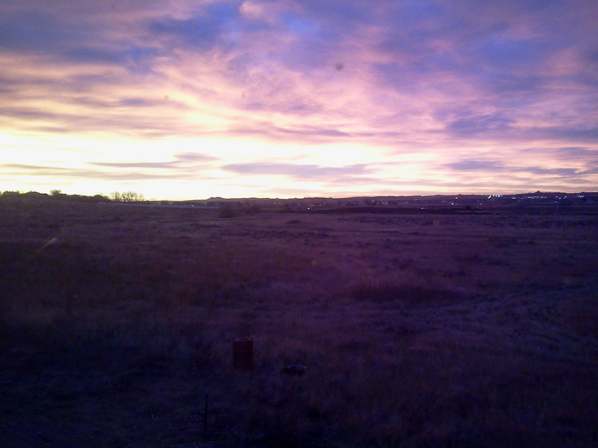 purple sunset over field