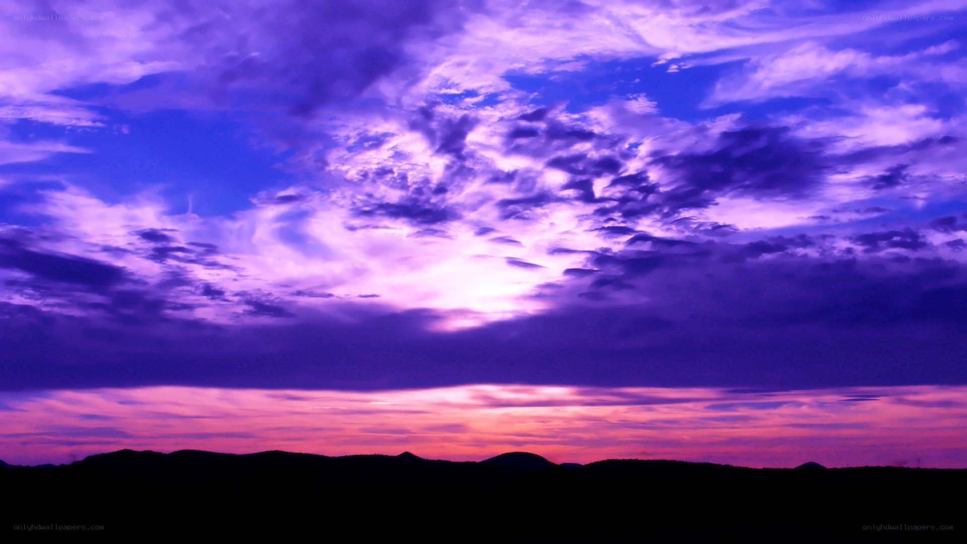 purple sunset over hills