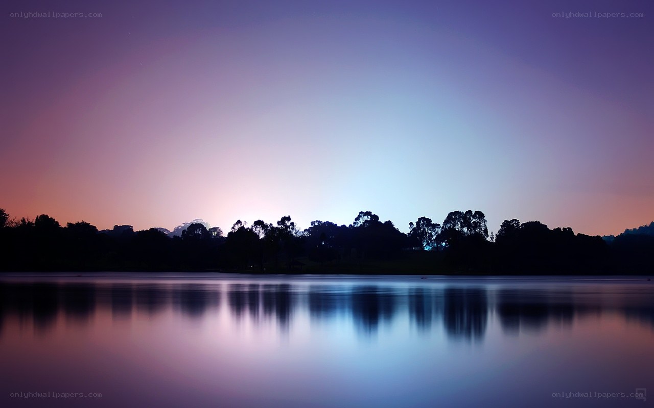 Purple sunset over lake