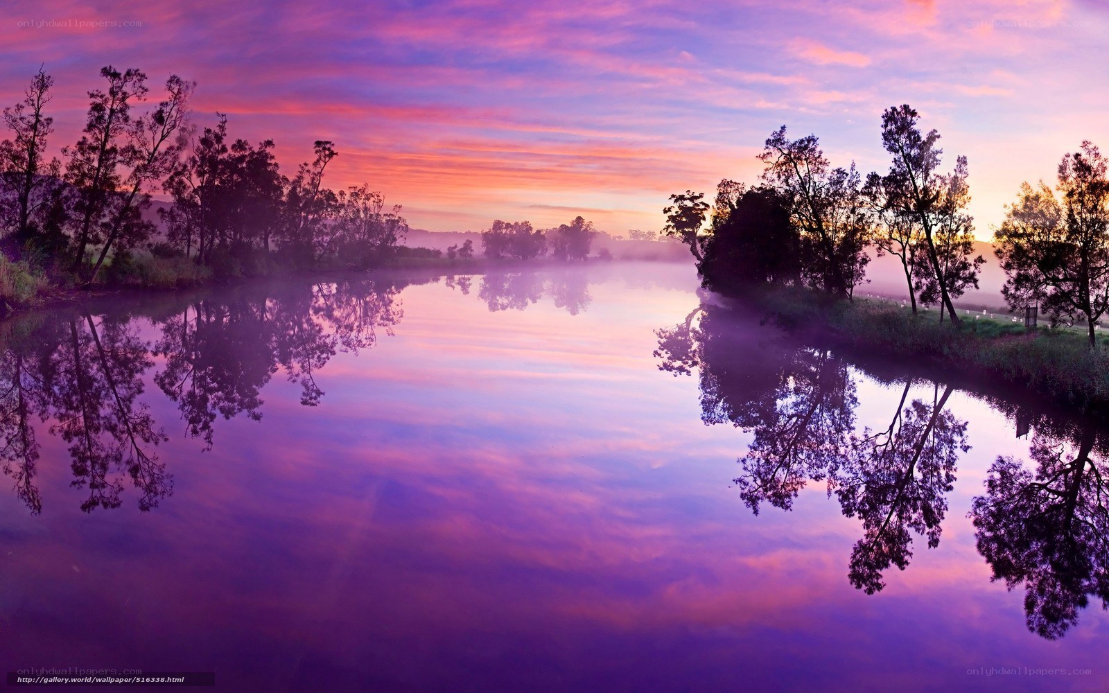 Purple sunset over misty river