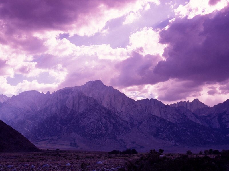 Purple sunset over mountain range