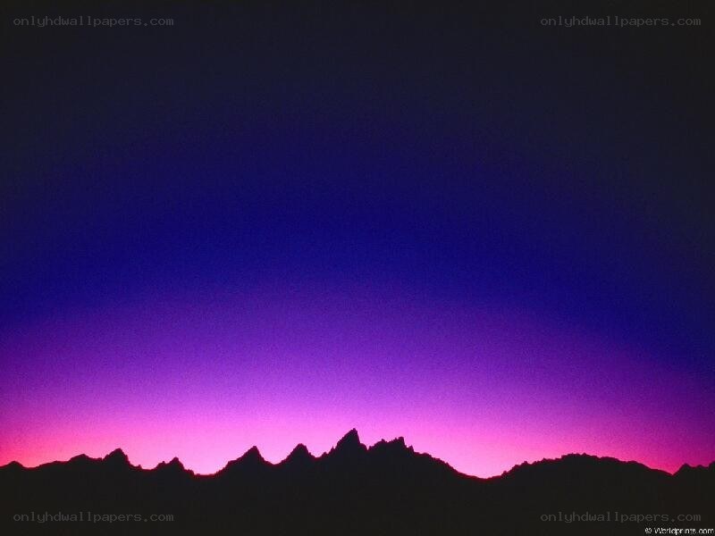Purple sunset over mountains