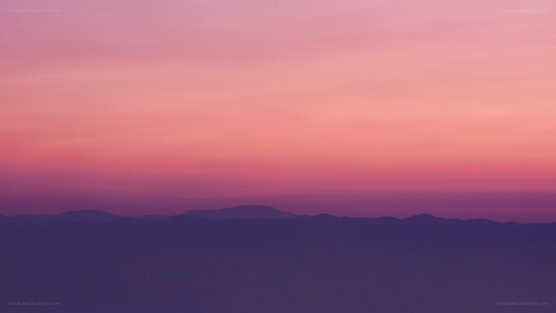 Purple sunset over mountains