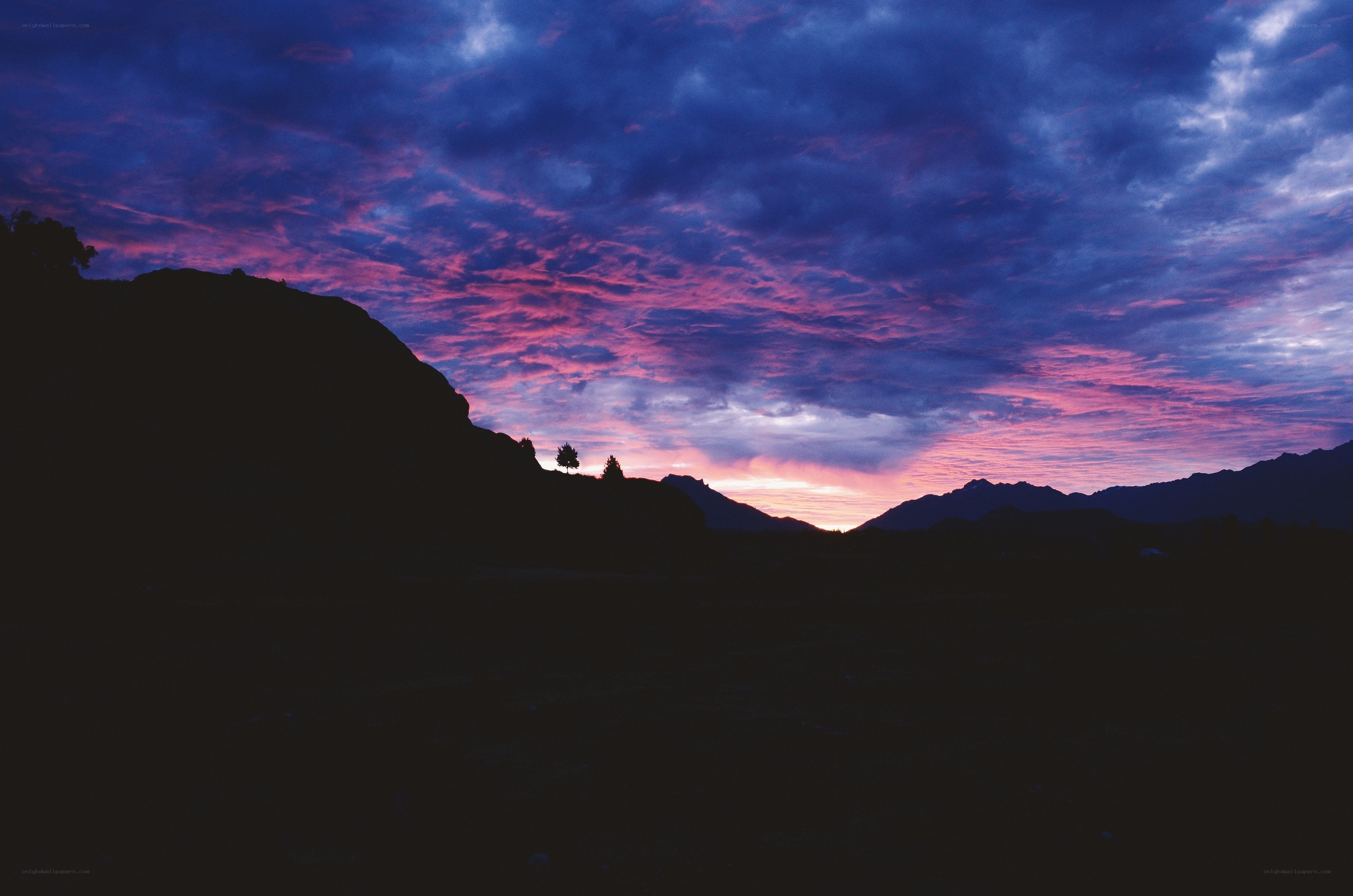 Purple sunset over mountains