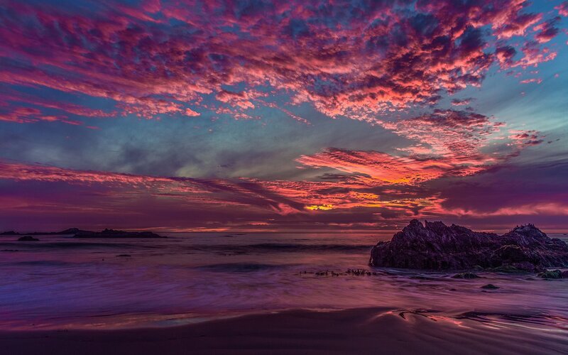 Purple Sunset over Ocean — Dramatic, Photograph, Clouds, Rocks, Beach
