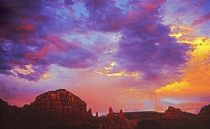 Purple sunset over red rock formations