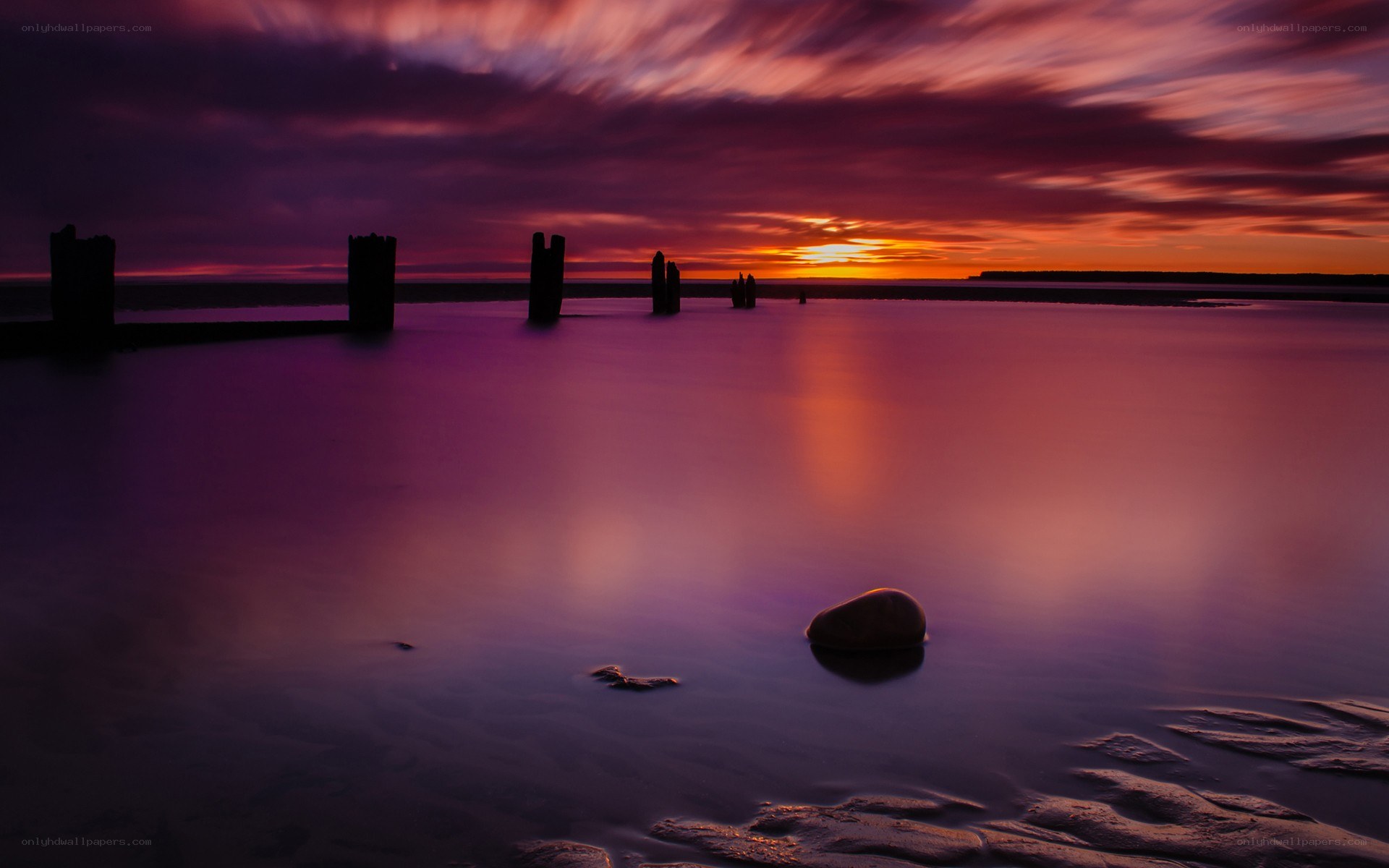 Purple sunset over water