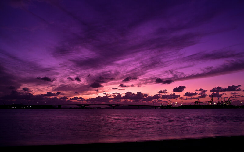 Purple Sunset over Water — Dramatic, Photograph, Bridge