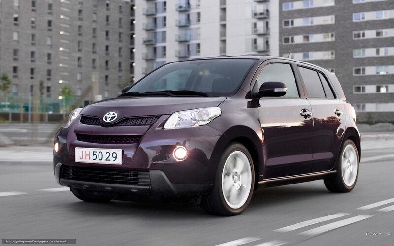 Purple Toyota Scion xD in city