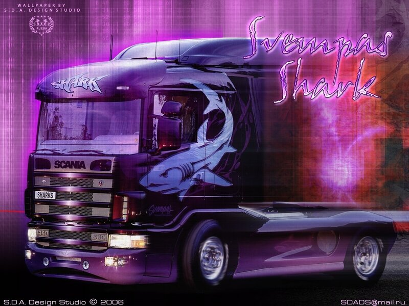 purple truck with shark design