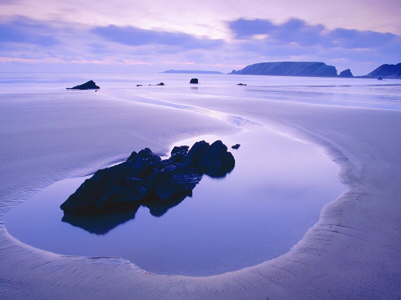 Purple twilight on a sandy beach