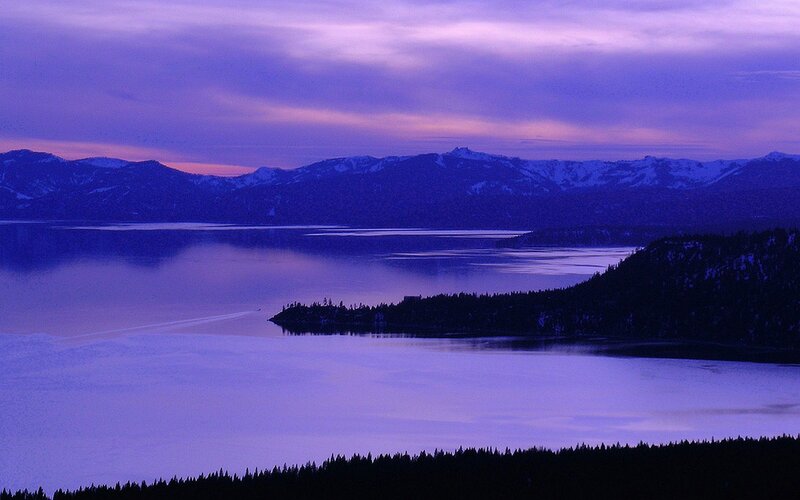 Purple twilight over a mountain lake