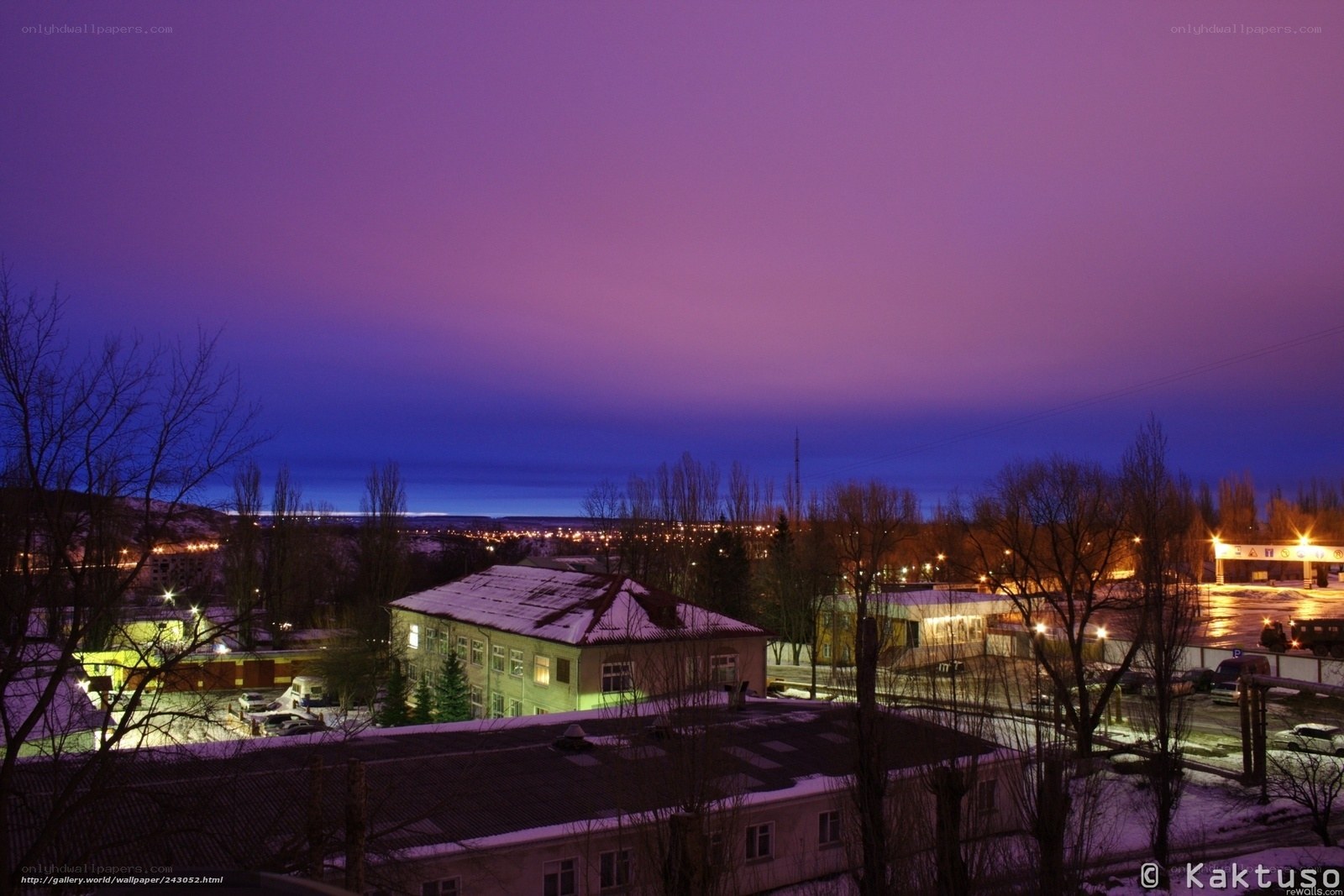 purple twilight over a snowy town
