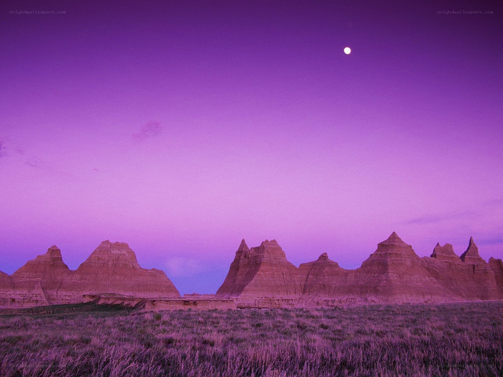 Purple twilight over badlands