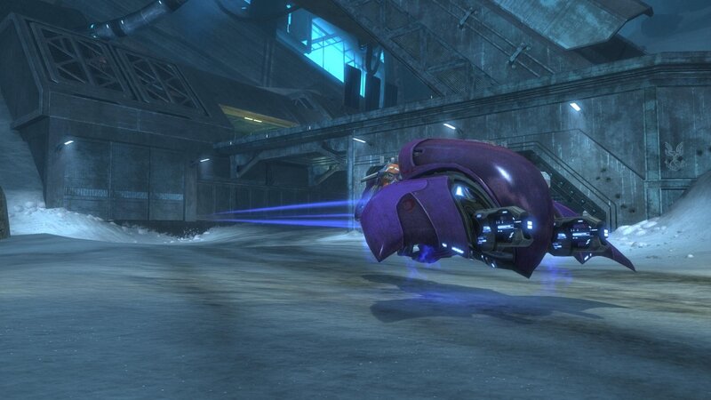 purple vehicle in snowy hangar
