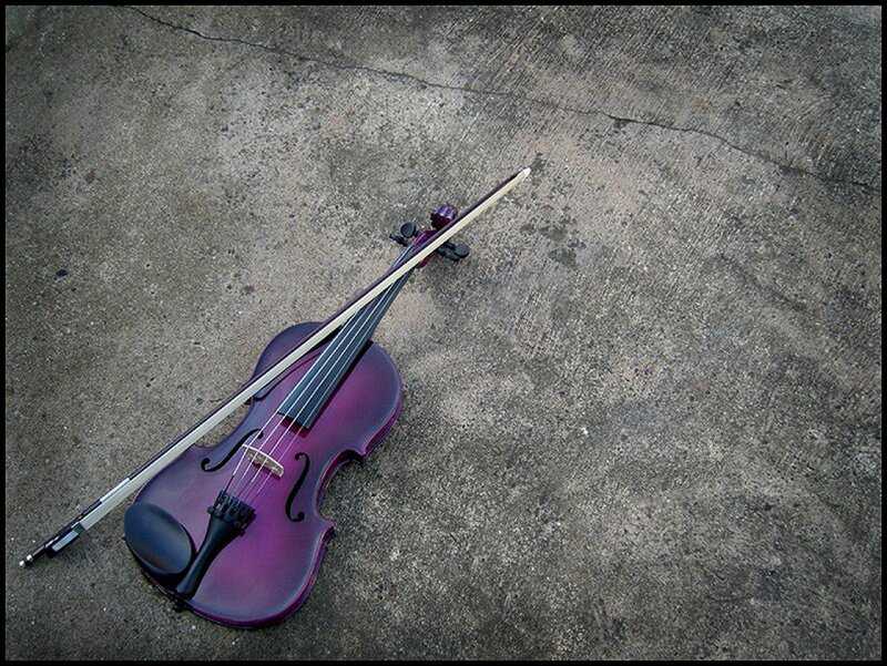 Purple Violin on Concrete