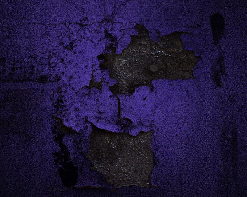 purple wallpaper with peeling texture