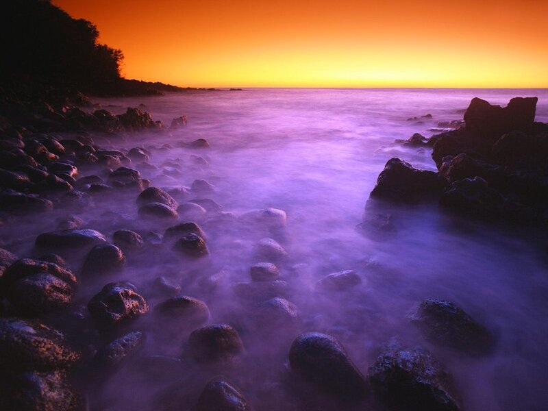 Purple waves at sunset