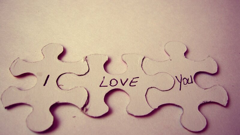 puzzle pieces with 'i love you'