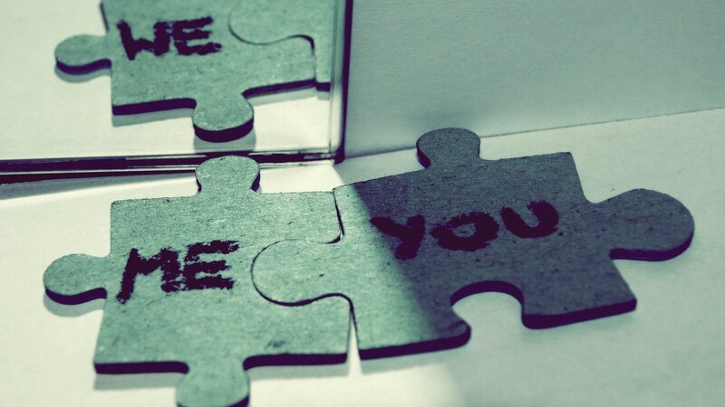 puzzle pieces with words me you we