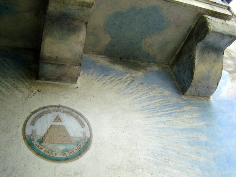 pyramid emblem on wall
