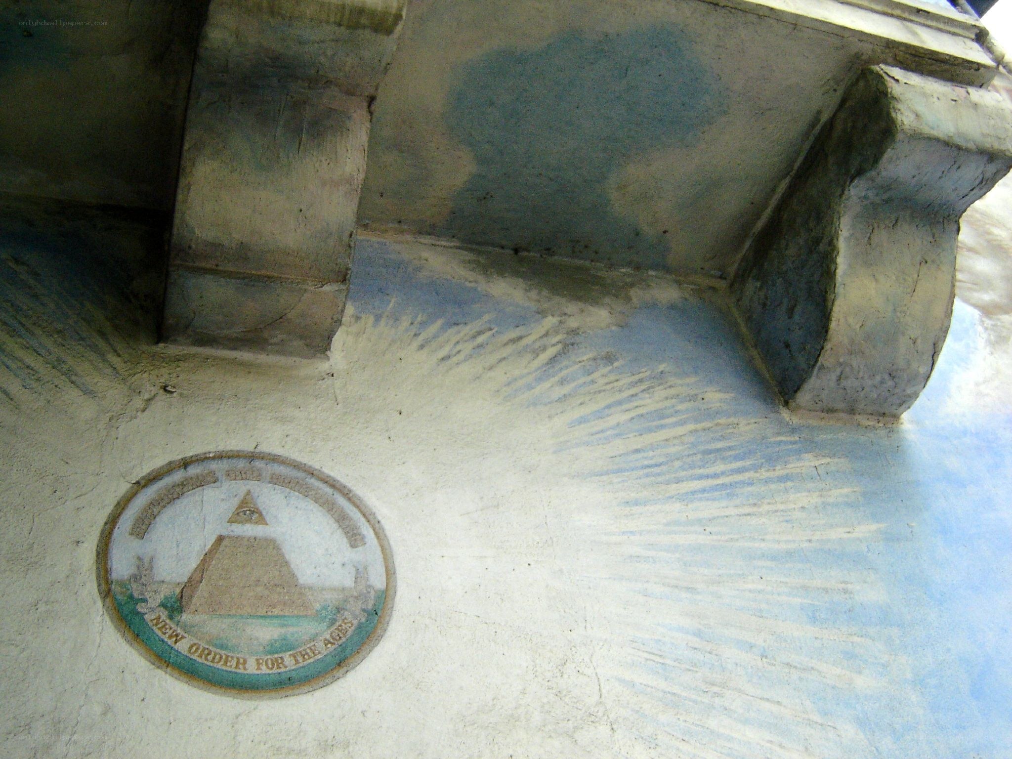 pyramid emblem on wall