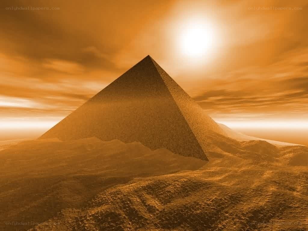 pyramid under golden sky
