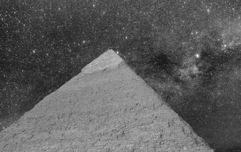 Pyramid under starry sky