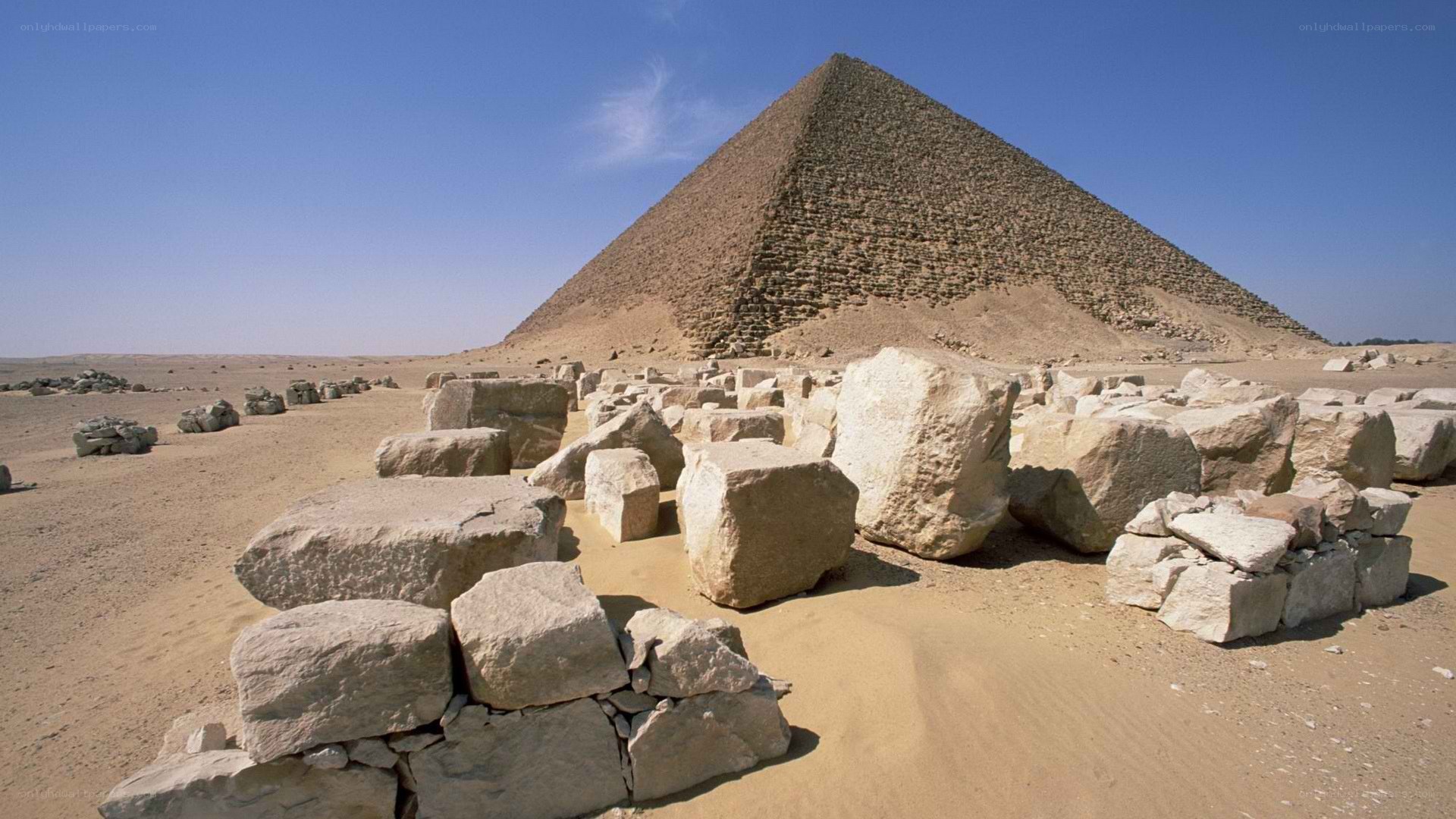 Pyramid with rubble in desert