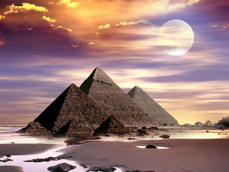 Pyramids at sunset with moon