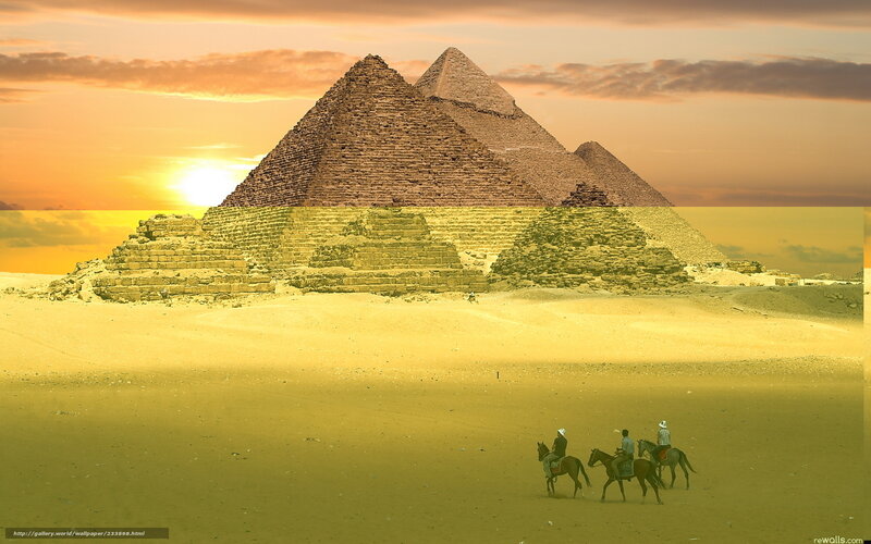 Pyramids at sunset with riders