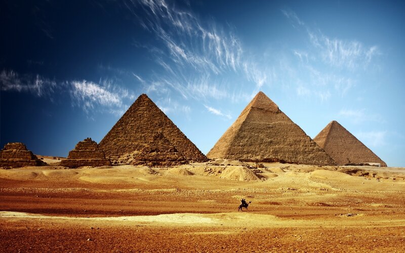 Pyramids in Desert — Blue, Dramatic, Afternoon, Photograph, Camel