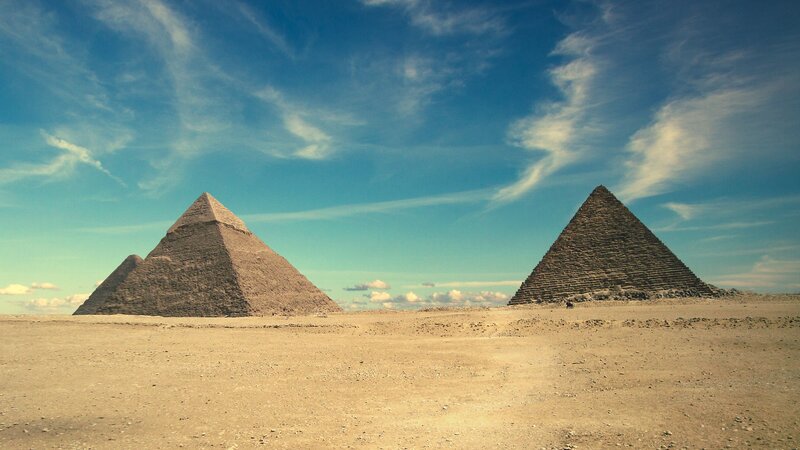 Pyramids of Giza in desert