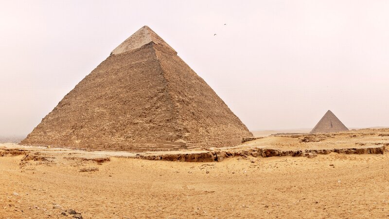 Pyramids of Giza in desert