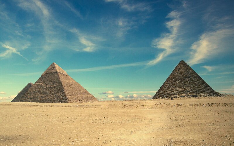 Pyramids of Giza in desert