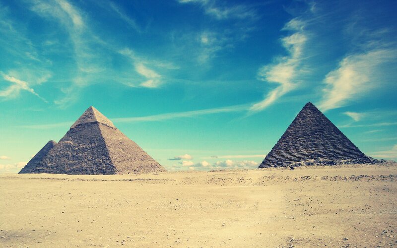 Pyramids of Giza in desert