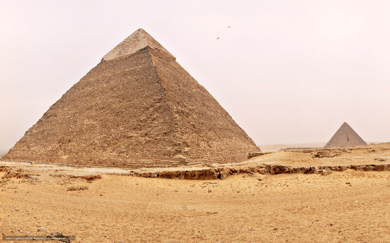 Pyramids of Giza in desert