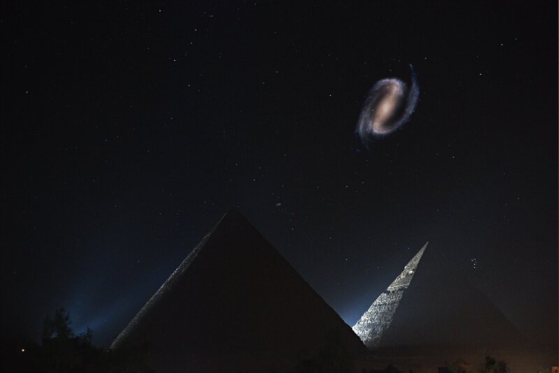 Pyramids under a galaxy sky