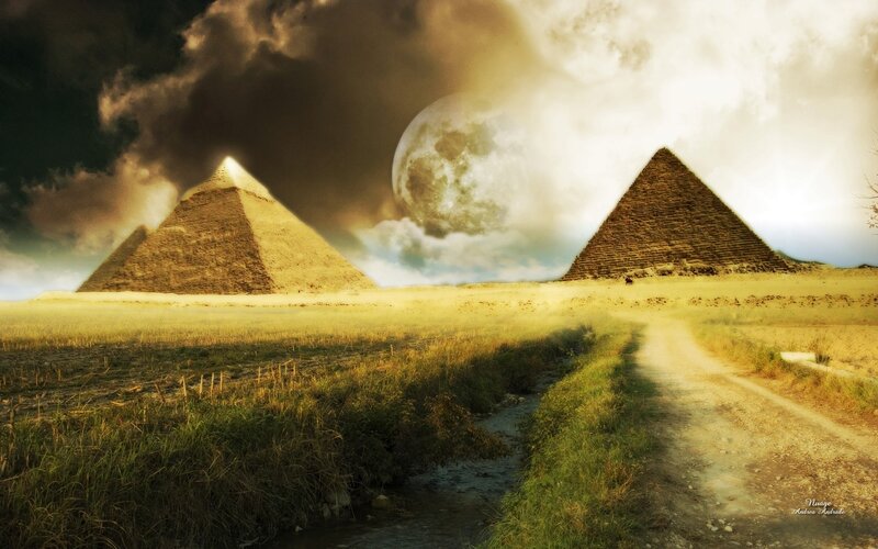 Pyramids under a giant moon