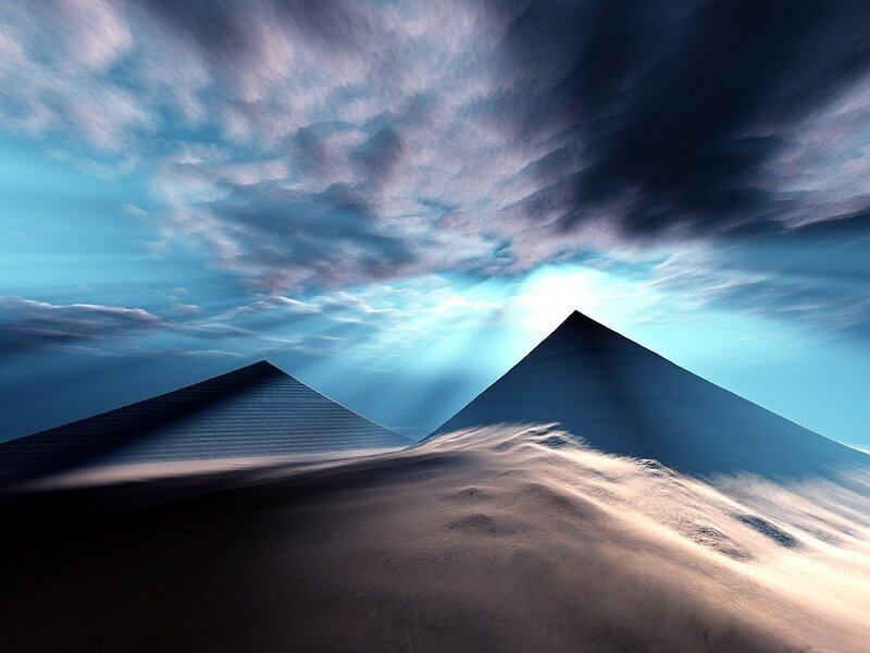 Pyramids under dramatic sky