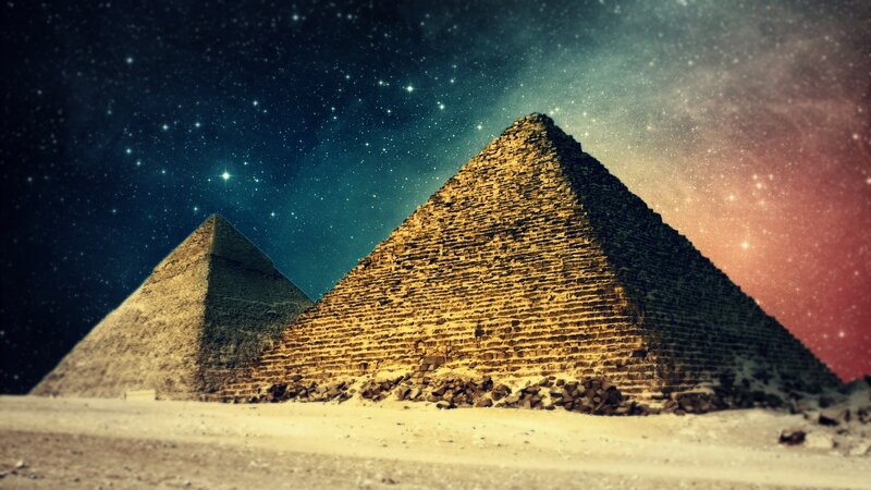 Pyramids under starry sky
